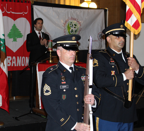 Richard Anter III leads the US national anthem with Army Color Guard