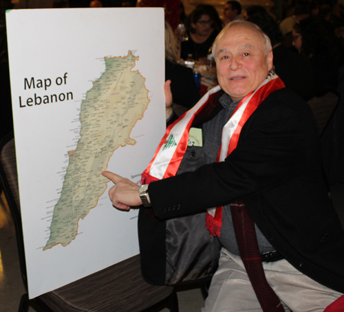 Dr. Abdo Orra showing his hometown on the map of Lebanon 