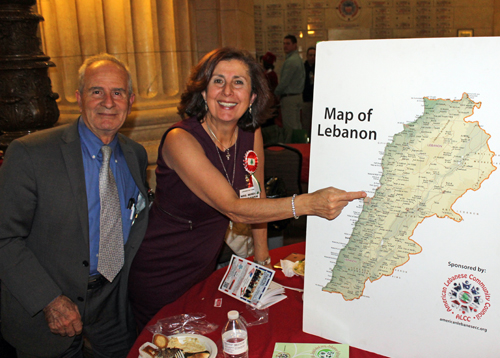 Tony and Mona Abdulkarim show their hometown on the map of Lebanon