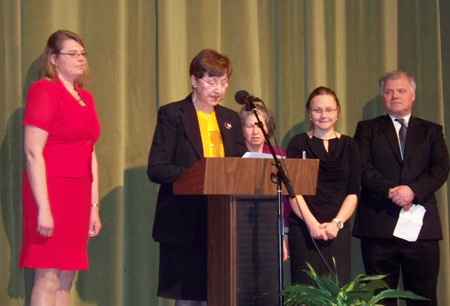Representatives from Cleveland Lithuanian schools were recognized and given checks from the Club for their schools.