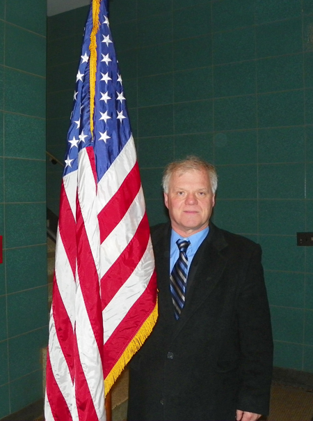 Algis Gudenas with US Flag