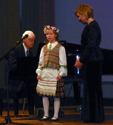 young Lithuanian girl sings with Virginia Bruozis-Muliolis 