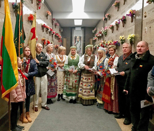 Paying respect to the signers. Eugene Dicevicius, Dr. Vik Stankus, Ruta Degtutis, officers of the Cleveland Lithuanian Community and scouts.