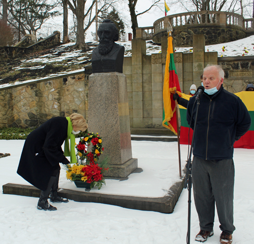 Ingrida Bublys placing flowers 