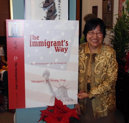 Margaret Wong with cover of her new book