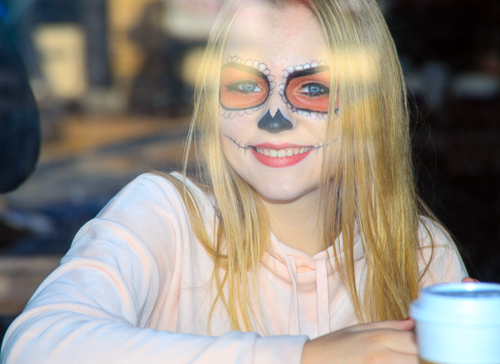 Girl ready for the Skulls and Skeletons procession on Day of the Dead in Cleveland