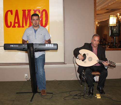 Musicians Joe on keyboard and Danny Lahood on oud