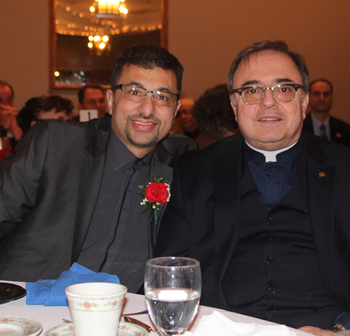 Ali Faraj and Father Naim Khalil