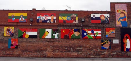 Ethnic mural on the wall of Sheliga Drug Store at 6125 St.Clair Avenue