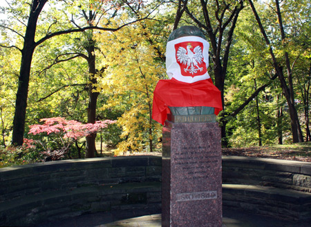 Bust of Frederic Chopin covered with Polish flag in Cleveland Polish Cultural Garden