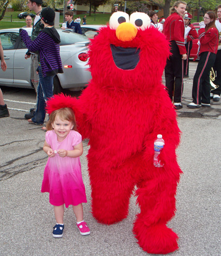 Elmo and little girl at 2010 Parma Ohio Polish Constitution Day Parade