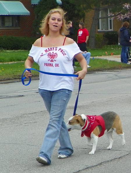 Girl with dog at Polish Constitution Day Parade in Parma Ohio