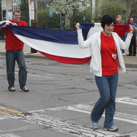 Huge red white and blue banner at Polish Constitution Day Parade in Cleveland's Slavic Village