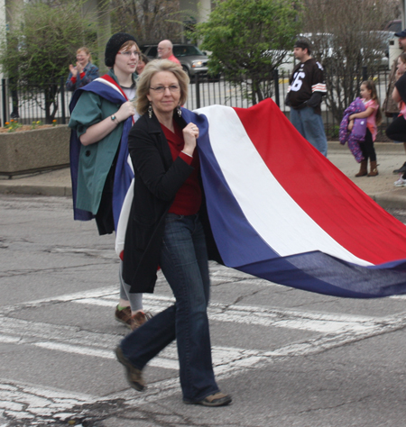 Huge red white and blue banner at Polish Constitution Day Parade in Cleveland's Slavic Village