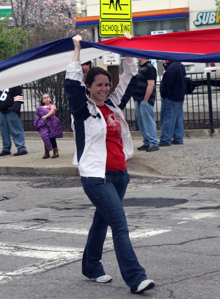 Huge red white and blue banner at Polish Constitution Day Parade in Cleveland's Slavic Village