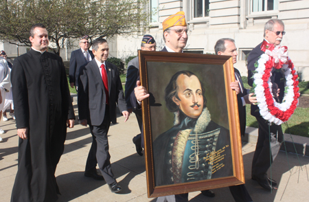 Marching from Cleveland City Hall to the Pulaski cannon