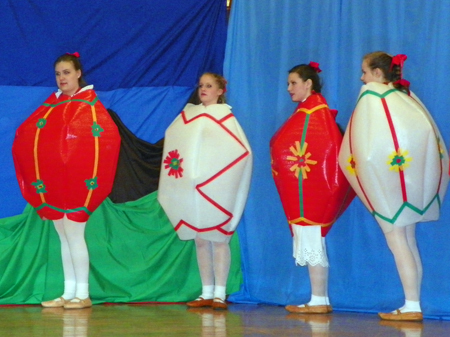 Piast girls dressed as Pisanki - colorful Easter eggs