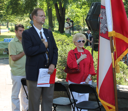 Dr Sean Martin, Gary Kotlarsic and Irene Morrow Singing the national anthems