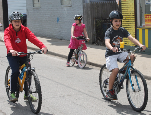 Riding bikes at 2014 Polish Constitution Day Parade in Slavic Village