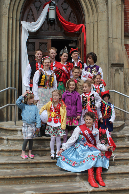 Community leaders posed on the steps of the Shrine Church of Saint Stanislaus