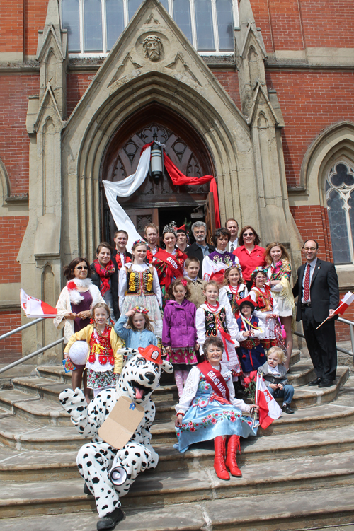 Community leaders posed on the steps of the Shrine Church of Saint Stanislaus