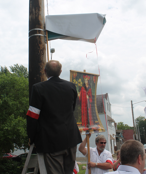 John Niedzialek unveiling the street sign