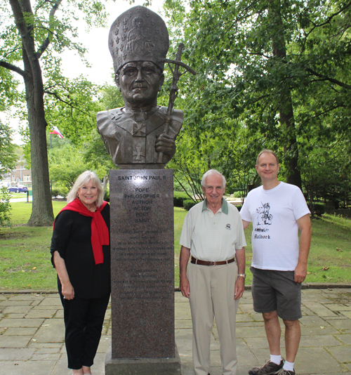 Connie Adams, Gene Bak and Gary Kotlarsic with bust of John Paul II
