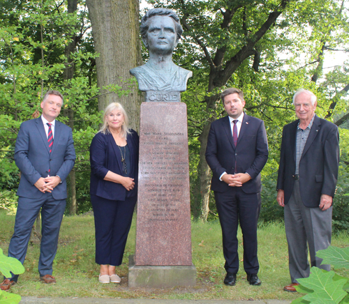 Posing at the Madame Curie bust in the Polish Cultural Garden