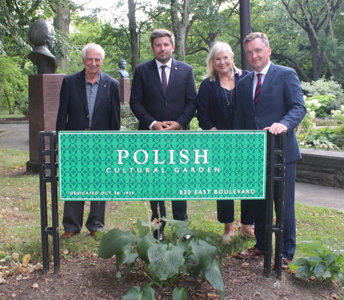Polish Cultural Garden sign - Eugene Bak, Connie Adams, Adrian Kubicki, and Mateusz Gmura