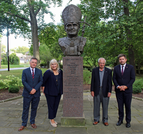 Posing at the Saint John Paul II bust in the Polish Cultural Garden