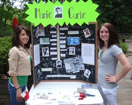 Bethany Santiago-Meyus and Christine Oszris with their projct on Madame Curie