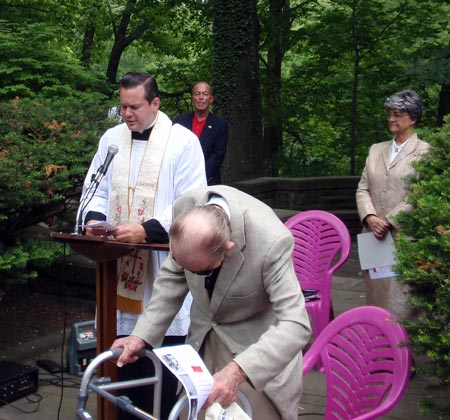 Rev. Eric Orzech, president of the Polish American Priests Association, gives the Invocation