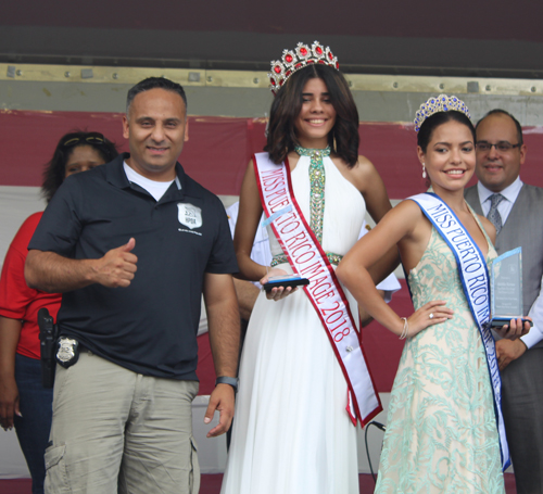Officer Emmanuel Velez and 2018 Miss Puerto Rican Image Nayeli Claudio and  Runnerup Aleishka Marrero