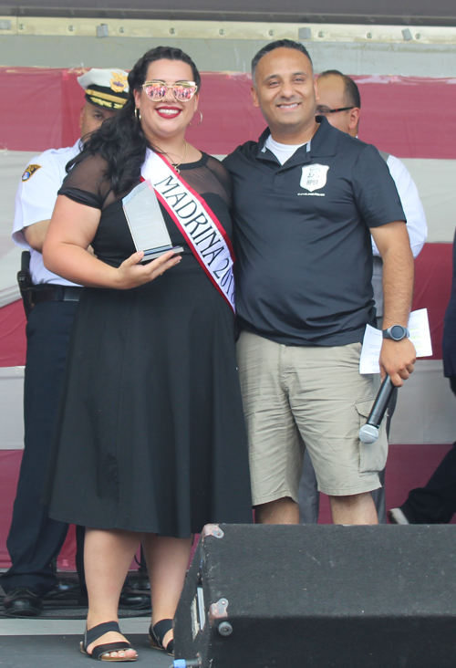 Madrina Selina Pagan and Officer Emmanuel Velez