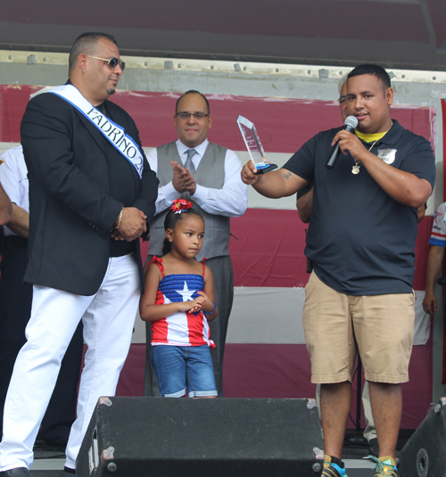 Padrino Papo Ruiz with Officer Freddy Diaz