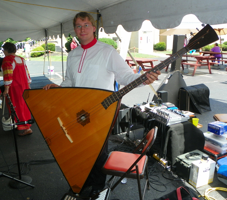 Mathew Keim of Mogadore Balalaika Orchestra with contra bass balalaika