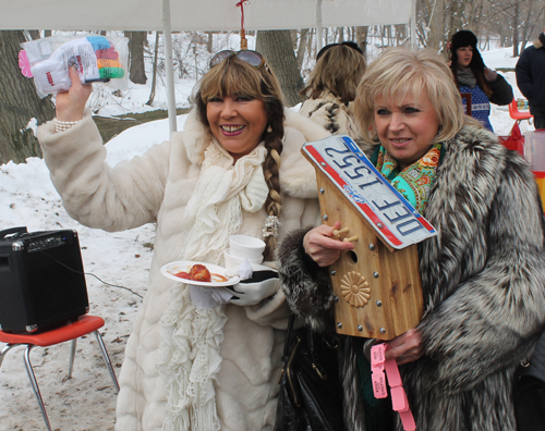 Raffle winners Galina Khlader and Natalie Boloussova