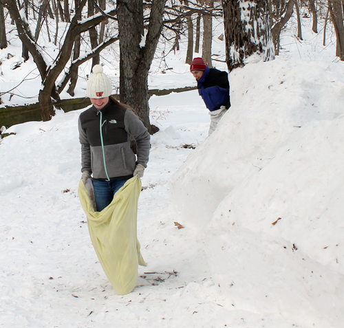 Sack race around Snow fort at Maslenitsa celebration in Cleveland Russian Cultural Garden