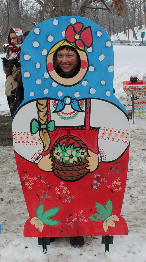 posing with life size two dimensional matryoshka (Russian nesting) dolls in Cleveland Russian Cultural Garden