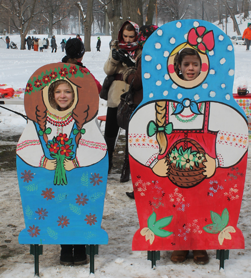 posing with life size two dimensional matryoshka (Russian nesting) dolls in Cleveland Russian Cultural Garden