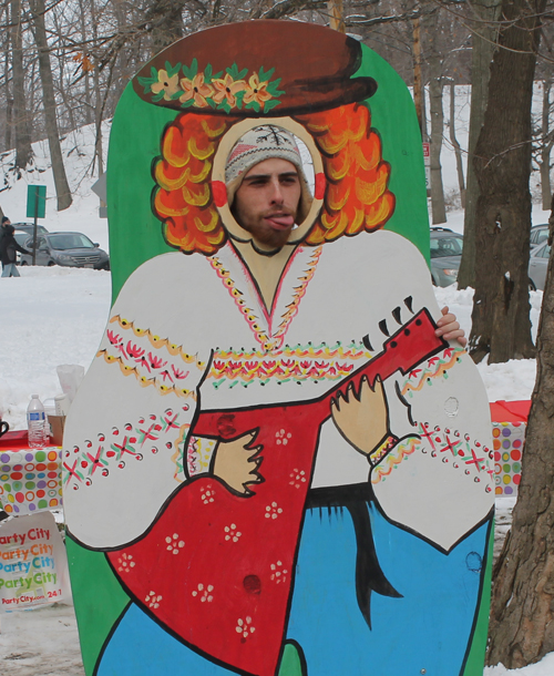 posing with life size two dimensional matryoshka (Russian nesting) dolls in Cleveland Russian Cultural Garden