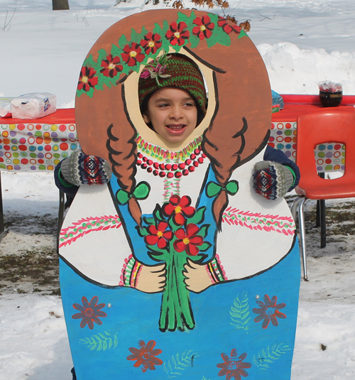 posing with life size two dimensional matryoshka (Russian nesting) dolls in Cleveland Russian Cultural Garden