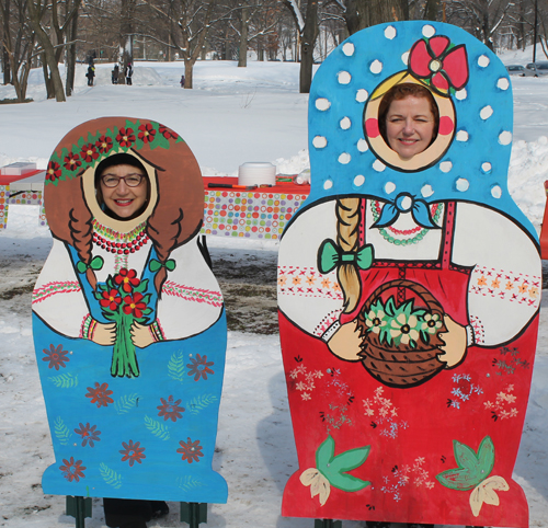 posing with life size two dimensional matryoshka (Russian nesting) dolls in Cleveland Russian Cultural Garden