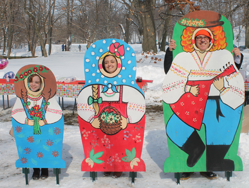 posing with life size two dimensional matryoshka (Russian nesting) dolls in Cleveland Russian Cultural Garden