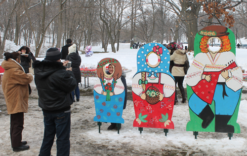 posing with life size two dimensional matryoshka (Russian nesting) dolls in Cleveland Russian Cultural Garden