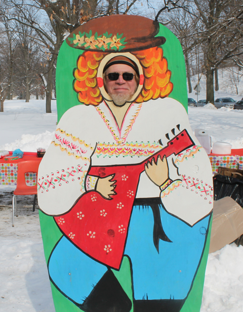 posing with life size two dimensional matryoshka (Russian nesting) dolls in Cleveland Russian Cultural Garden