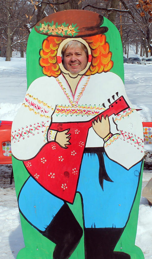 posing with life size two dimensional matryoshka (Russian nesting) dolls in Cleveland Russian Cultural Garden