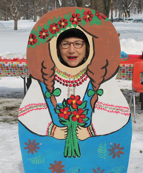 posing with life size two dimensional matryoshka (Russian nesting) dolls in Cleveland Russian Cultural Garden