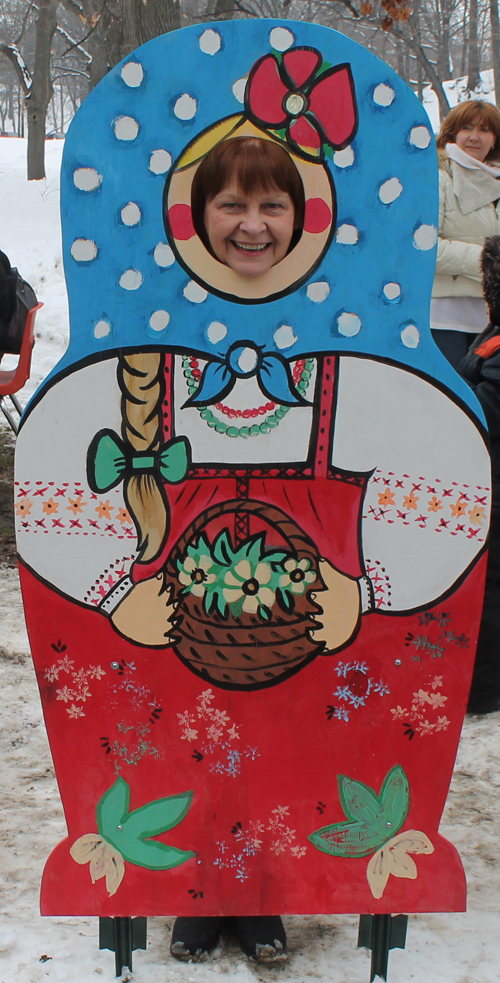 posing with life size two dimensional matryoshka (Russian nesting) dolls in Cleveland Russian Cultural Garden