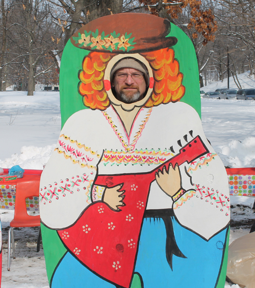 posing with life size two dimensional matryoshka (Russian nesting) dolls in Cleveland Russian Cultural Garden